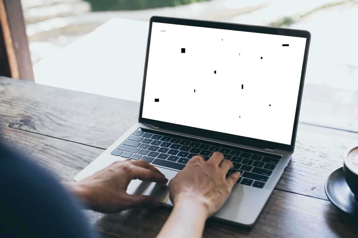 What is a white spot on a laptop screen?
